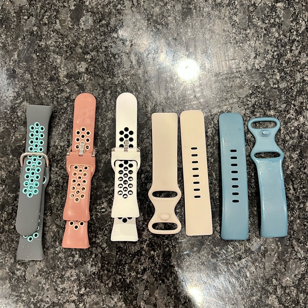 Fitbit Charge 5 watchbands two OEM and three generic.